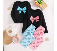 Set di 4 pezzi di abbigliamento casual ed elegante per ragazze adolescenti, composto da una maglietta nera a maniche lunghe con colletto a girocollo e fiocco, pantaloni con stampa a fiocchi, e pigiama