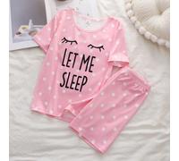 Set pigiama a maniche corte a pois rosa per ragazze. La parte superiore presenta un collo rotondo, maniche corte e una stampa in nero con il testo "LASCIAMI DORMIRE" e grafiche di ciglie, esprimendo u