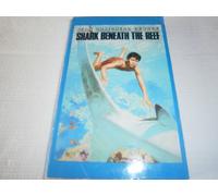 shark beneath the reef