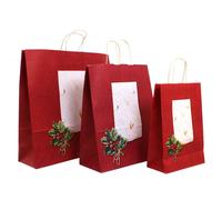Shopper buste in carta natalizie Holly rosso con manici ritorti