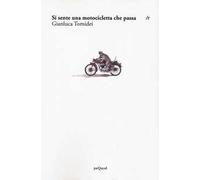 Si sente una motocicletta che passa