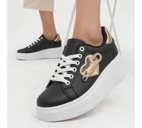 Sneakers da donna con plateau e dettaglio a cuore metallico Fai un salto di qualità nelle tue scarpe, letteralmente. Queste sneakers con plateau rialzato donano un fascino giocoso e uno stile inconfon
