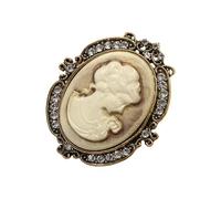 Spilla ritratto con accenti in cristallo e cornice traforata | Struttura in lega, ritratto centrale scolpito, finitura decorativa dimensionale dal centro alla cornice esterna