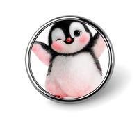 Spilla rotonda a forma di pinguino con ali spiegate.