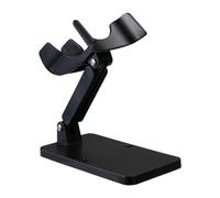 Stand scanner di codici a barre universali per la libreria tenendo le mani