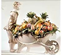 Statua Capodimonte statuetta Uomo carriola con frutta in porcellana Statuina