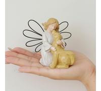 Statua di angelo che tiene un cane in resina per la figurina del cane