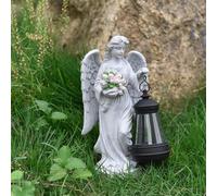 Statua di angelo che tiene un mazzo di fiori con luce solare, regalo