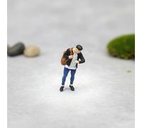 Statuetta Uomo con Zaino Dipinto a Mano Mini Figura Uomo che Guarda L'orologio