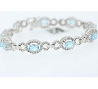 Sterling 4.0ct Ovale Laboratrio Sintetico London Topazio Blu .15ct Diamante Halo