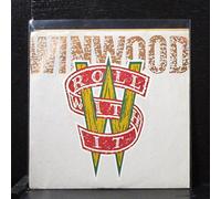 STEVE WINWOOD - ROLL WITH IT