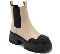 Stivaletti alla caviglia beige e neri con suole spesse e dentellate - design audace e a contrasto Stile affermativo con bottoni bicolor beige e noir à l'allure graphique. Leur tige en matière lisse, r