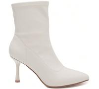 Stivaletti alla caviglia con tacco a spillo beige - Eleganza minimalista e femminile Laissez-vois séduire par la sobriété raffinée des bottines beiges à talon aiguille. La vostra silhouette purificata