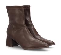 Stivaletti da donna dal design minimalista, gambale elasticizzato e tinta unita. Punta affusolata moderna in materiale sintetico. Tacco a blocco leggero e confortevole. Ideali per l'autunno e
