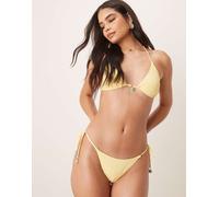 Stradivarius - Slip bikini giallo con laccetti laterali e charm XL