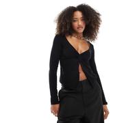 Stradivarius - Top a maniche lunghe nero in jersey con fiocco sul davanti M