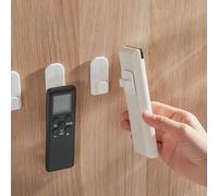 Supporto per telecomando da parete, autoadesivo, con design resistente per montaggio a parete, per telecomandi del condizionatore d'aria, telefoni cordless e chiavi, ganci salvaspazio in ABS (1 set)