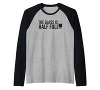 T-shirt divertente con scritta "Il bicchiere è mezzo pieno (di veleno"). Maglia con Maniche Raglan