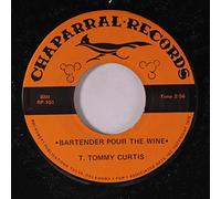 T. TOMMY CURTIS - bartender pour the wine / the rose