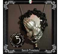 talismano magico gioiello ciondolo amuleto pendaglio simbolo saturno mani nero