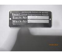 Targhetta Scudo WK2 I Luftwaffe Fieseler Fi 156 Flugzeugbau S84 Sach-Nr