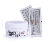 TATTOO HUSTLE BUTTER DELUXE ORIGINAL - Crema vegana post-tatuaggio 150ml + 2 bustine da 7,5g da viaggio - Burro di mango, papaya e karité - Riduce rossori e gonfiori - Favorisce la guarigione