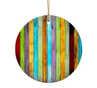 Tavole di legno variopinte che stampano l'ornamento circolare dell'albero di Natale che appende la decorazione natalizia