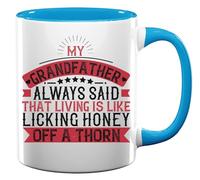 Tazza da tè e caffè in ceramica con scritta in inglese "My Grandfather Always Said That Living is Like Licking Honey Off a Thorn", colore azzurro