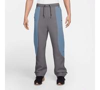 Pantaloni in fleece a blocchi di colore con orlo aperto Nike Tech - Uomo - Nero L