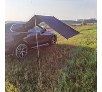 Tenda da campeggio da picnic all'aperto sul lato dell'auto a prova di