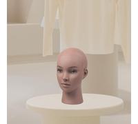 Testa di manichino calvo per parrucca che prepara il supporto per parrucca