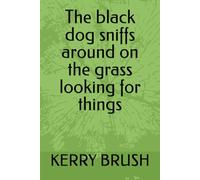 The black dog sniffs around on the grass looking for things