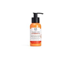 The Body Shop Vitamin C Revealing Liguid Peel Liquido detergente schiarente Peeling con vitamina C Esfolia delicatamente la pelle del viso Pacchetto con pompa 100 ml