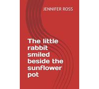 The little rabbit smiled beside the sunflower pot