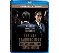 The Man Standing Next