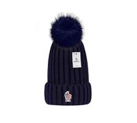 The new Versatile winter hat in wool warm wool hat knitted hat in wool ball dark blu dark blue