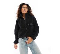 The North Face - Extreme - Pile nero con tasca con logo e zip corta L
