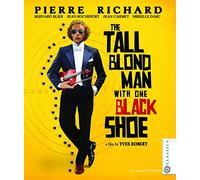 The Tall Blonde Man With One Black Shoe