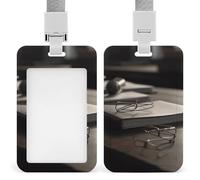 There is a book on the table ID Badge Holder with Breakaway Lanyard Vertical ID Card Holder Waterproof Plastic Card Sleeve Name Tags Protector Cover for Work Office Teacher Nurse Doctor