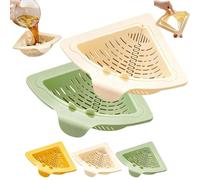 This space-saving magnetic corner sink strainer features a triangular sink drain basket that pops out automatically with a simple twist of the knob for space-saving storage. (Whinte+Green)