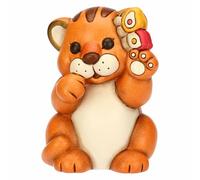 Thun - Tigre Thea in piedi con farfalla