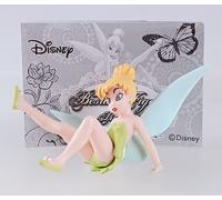 Tinker Bell - personaggio Disney accanto alla figura dal Giappone