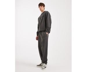 Tommy Jeans - Joggers taglio comodo nero slavato con logo 50