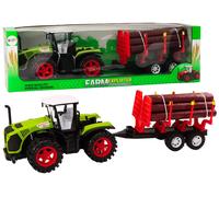 Trattore agricolo verde con rimorchio per tronchi