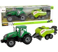 Trattore verde con falciatrice a inerzia
