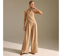 Tuta smanicata a collo alto e gamba ampia color beige: vita slim e gamba rilassata, perfetta per l'ufficio o brunch eleganti, realizzata in una morbida miscela di poliestere non elastico con corpetto