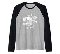 Tutto Il comportamento è Citazione di psicologia della Comunicazione Maglia con Maniche Raglan