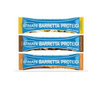 Ultimate-Italia | Barretta con 33% di proteine, vitamine e minerali | Box da 24 barrette proteiche da 40gr assortite nei gusti Banana, Caramello, Cioccolato