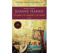 Un gatto, un cappello e un nastro