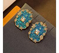 Un paio di orecchini vintage di metà secolo, di stile marittimo, con decorazioni a stella dorate e paillettes blu-verdi, adatti per l'uso quotidiano, feste, vacanze e regali per le donne Lega di rame